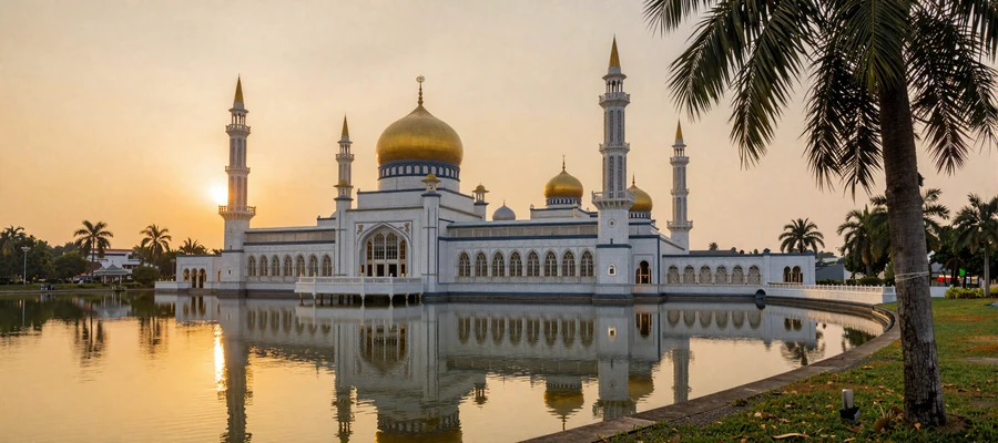 Sultan Omar Ali Saifuddien Mosque in Brunei reflected in lagoon at golden hour showcasing Bruneian Islamic architecture